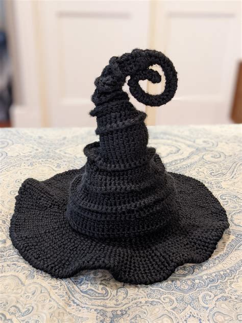 Elevate your Halloween decor with a twisted witch hat crochet pattern